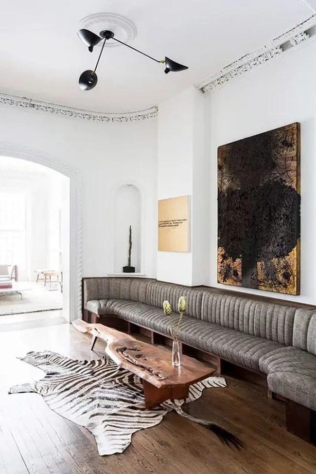 Gray Curved Sofa Meets Zebra Stripes