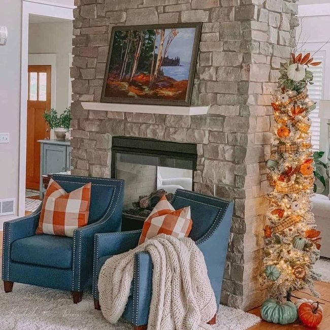 Blue Studded Chairs, Stone Fireplace