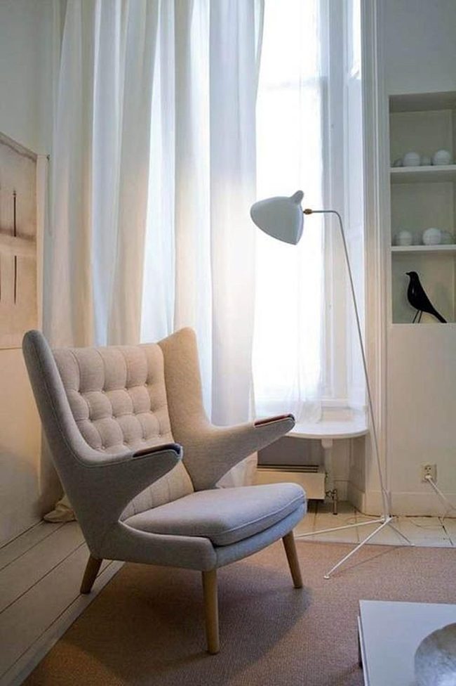 Sunlit White Room With Wooden Armchair