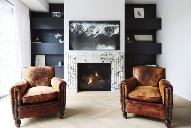 Marble Fireplace Meets Worn Leather