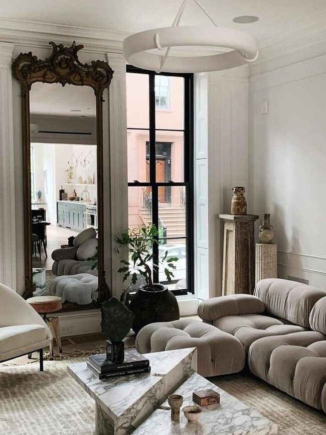 Dark Mirrors Against White Walls