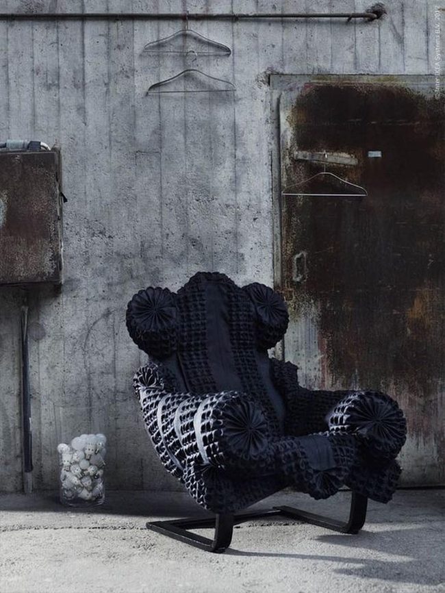 Raw Concrete Meets Black Velvet Chair