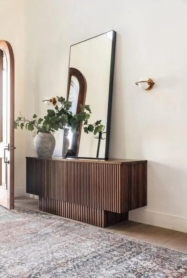 Grooved Wood And Leaning Mirrors
