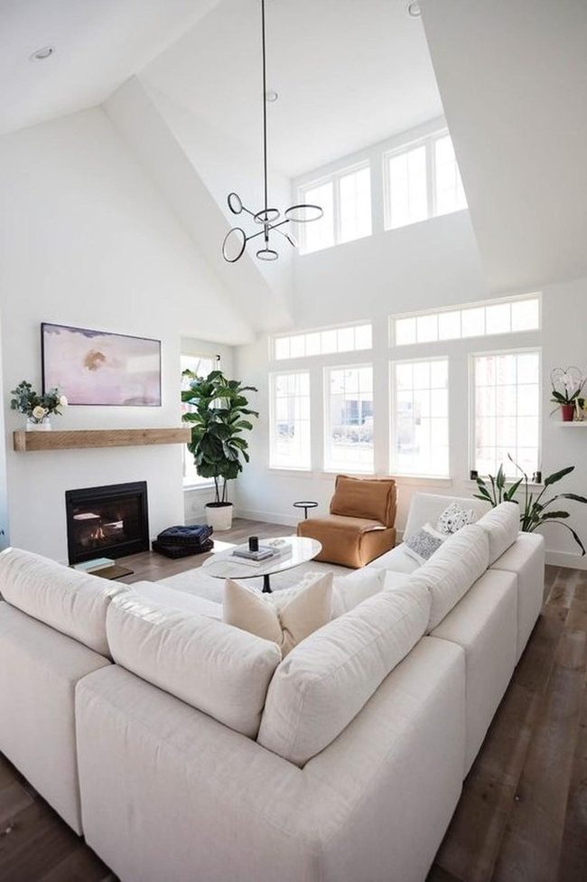 Black Fireplace And White Sectional