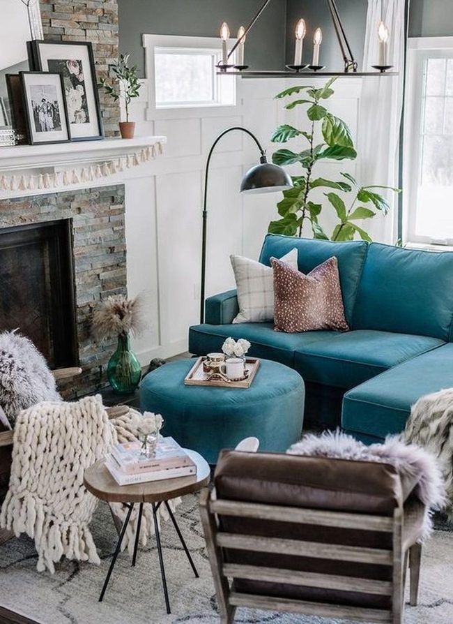 Teal Sectional With Stone Fireplace
