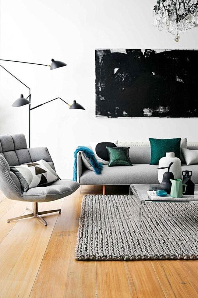 Black Abstract Art Above Gray Seating