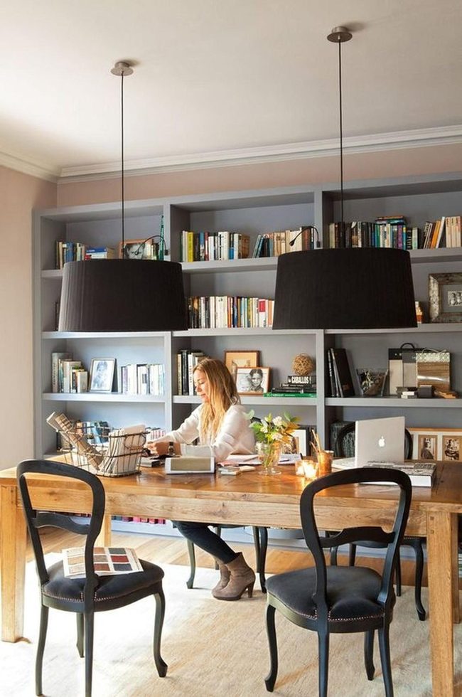 Black Lamps Above Wooden Workspace
