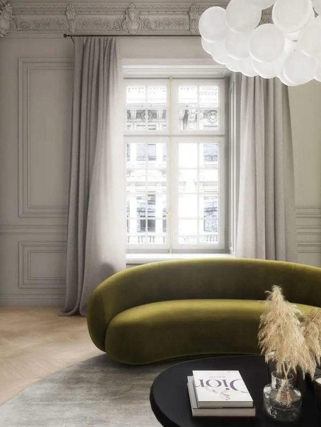 Green Curved Sofa With Classic Moldings