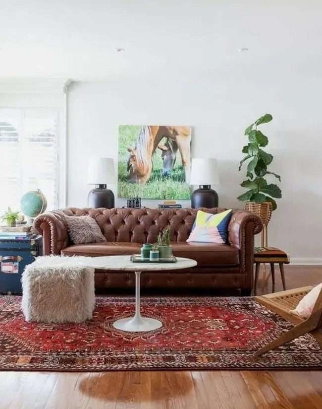 Brown Leather Sofa With Red Rug