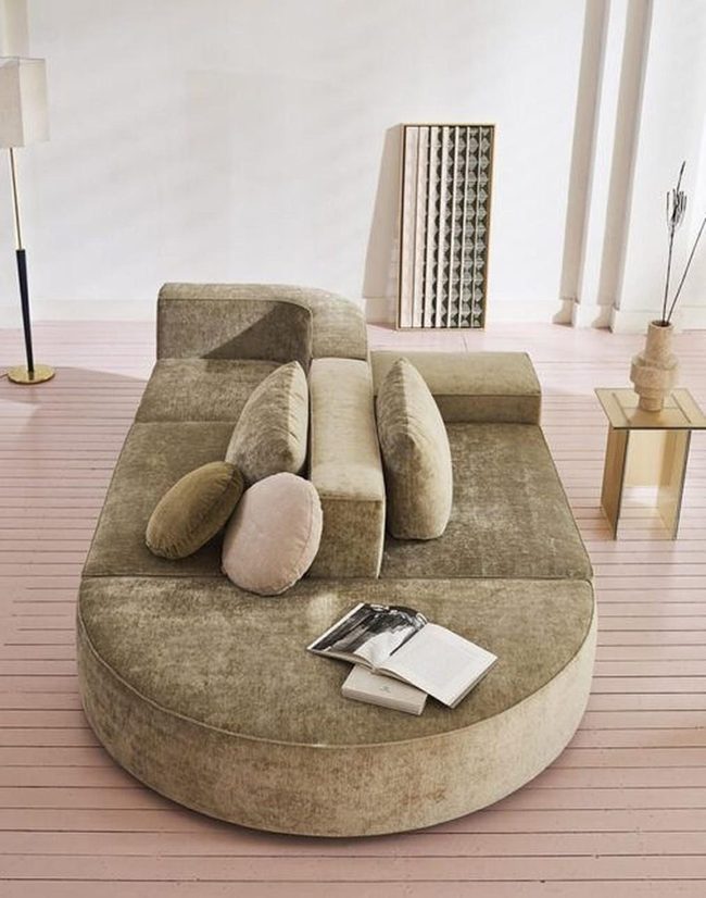 Curved Beige Seating Pink Wood Floors