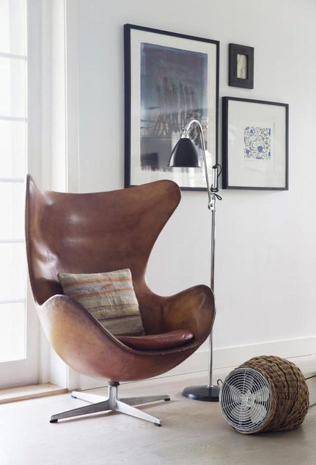 Curved Leather With Striped Pillows