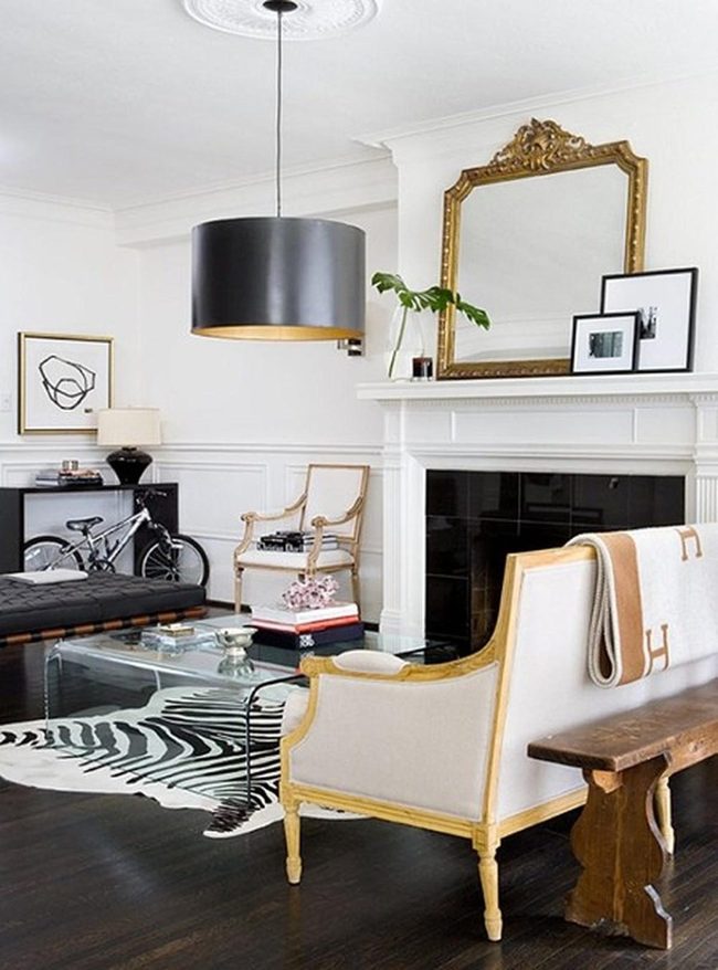 Black Pendant Above Zebra Rug