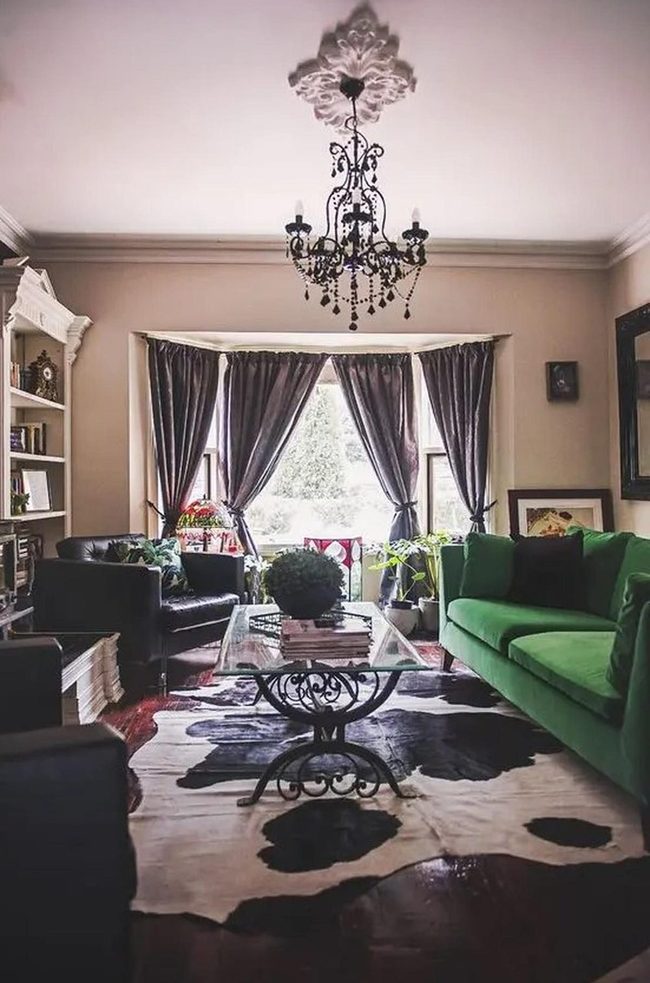Green Sofa Meets Ornate Chandelier