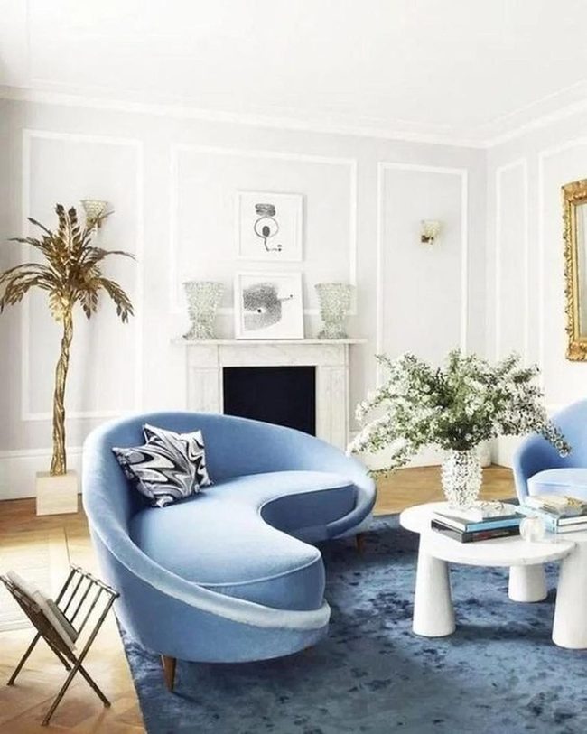 Curved Blue Sofa, Light Walls