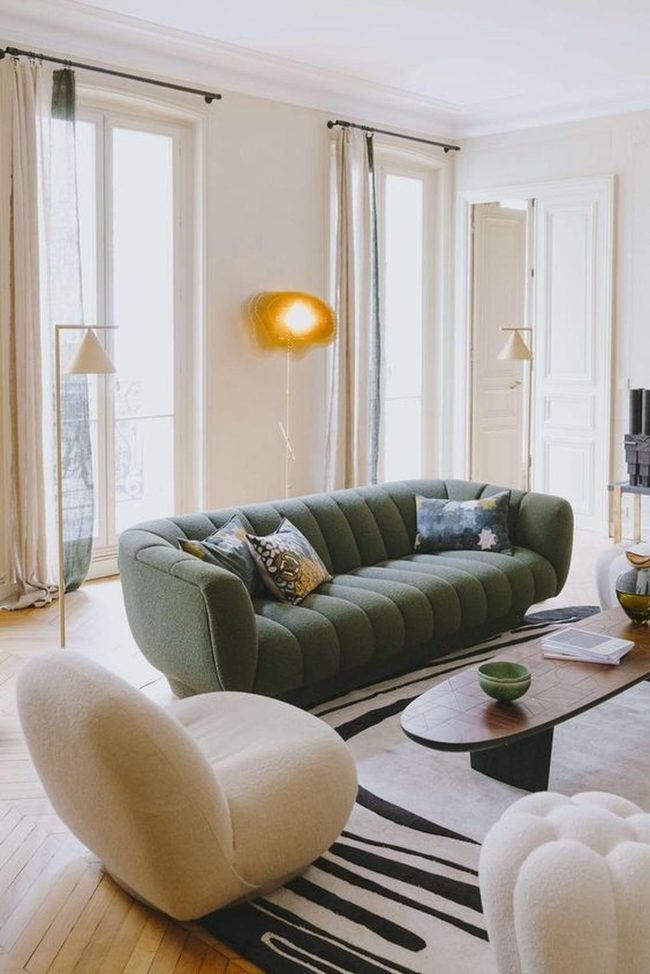 Sunlit Green Sofas And Wooden Warmth