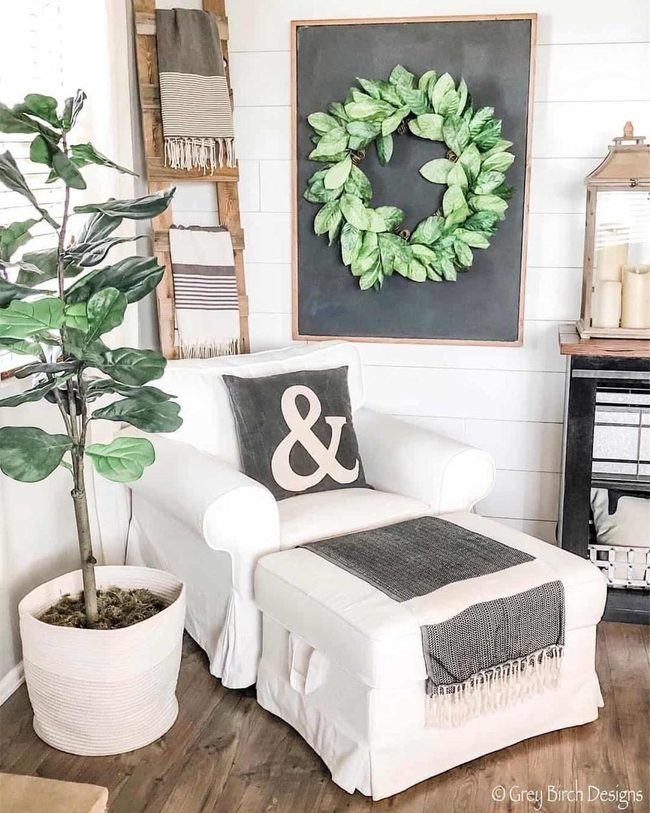 White Slipcovered Chair With Wood Ladder