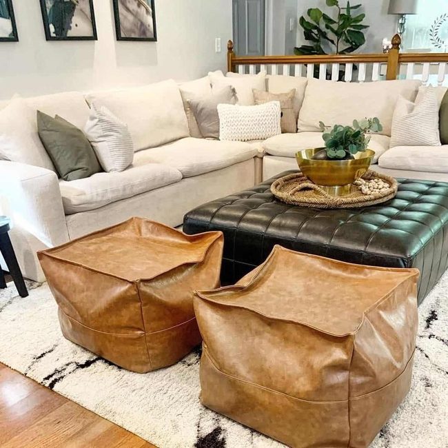 White Sectional With Black Leather Ottoman