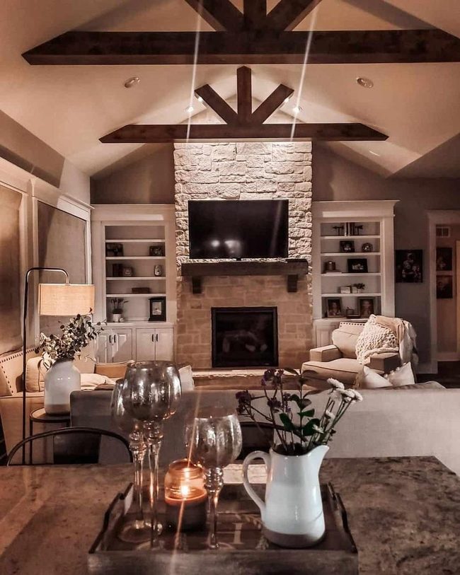 Dark Wood Vaults Meet Stone Fireplace