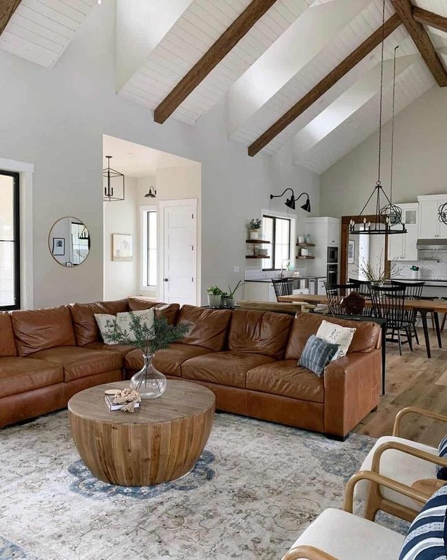 Wooden Drum Table Anchors Vaulted Space