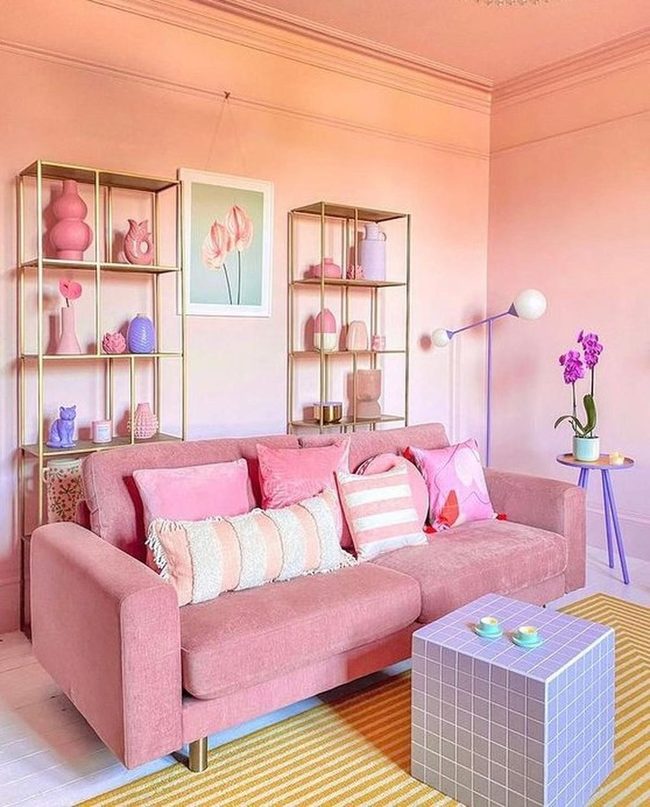 Pink Walls, Gold Shelves, Cheerful Living