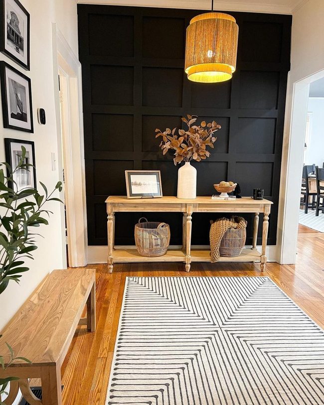 Black Wall With Warm Wood Contrast
