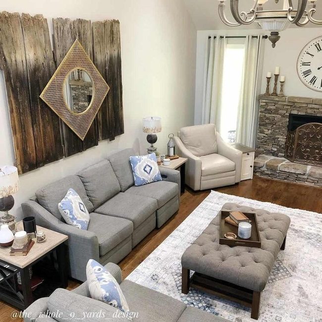 Stone Fireplace Anchors Warm Wood Living