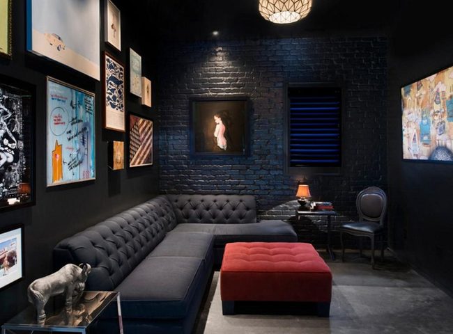 Black Tufted Couch, Red Ottoman Statement