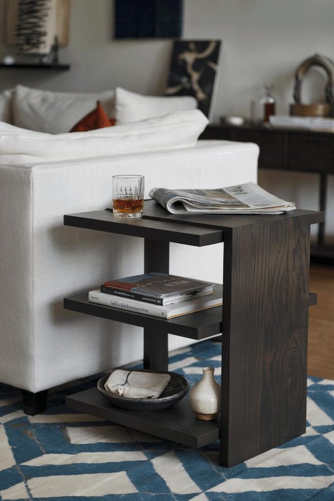 Dark Oak Table With Blue Geometric Rug