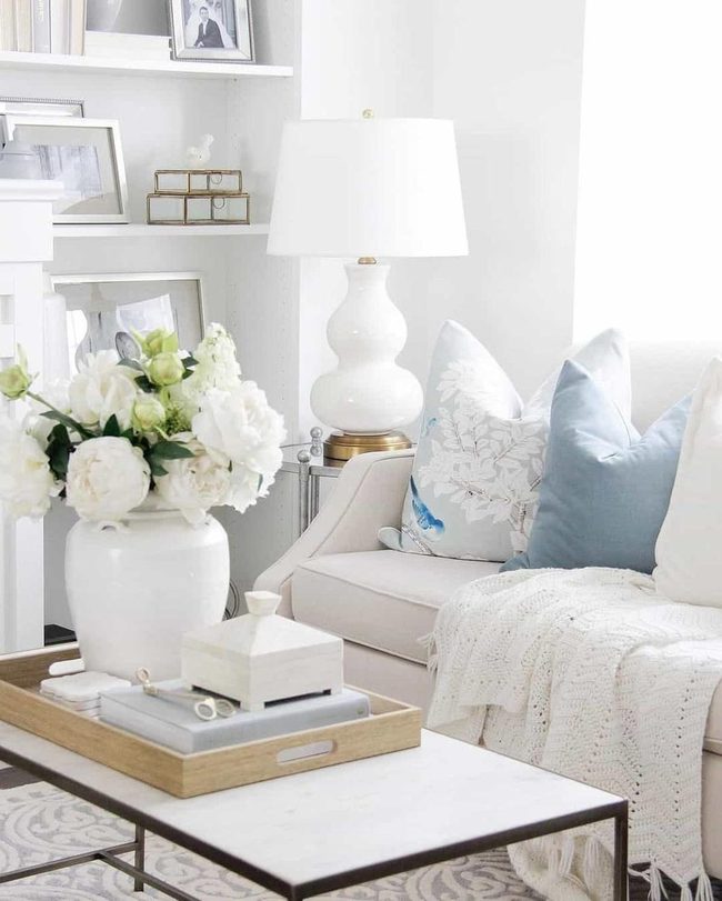 White Florals And Blue Cushions