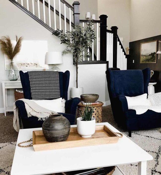 Navy Wingback Chairs And Geometric Rug