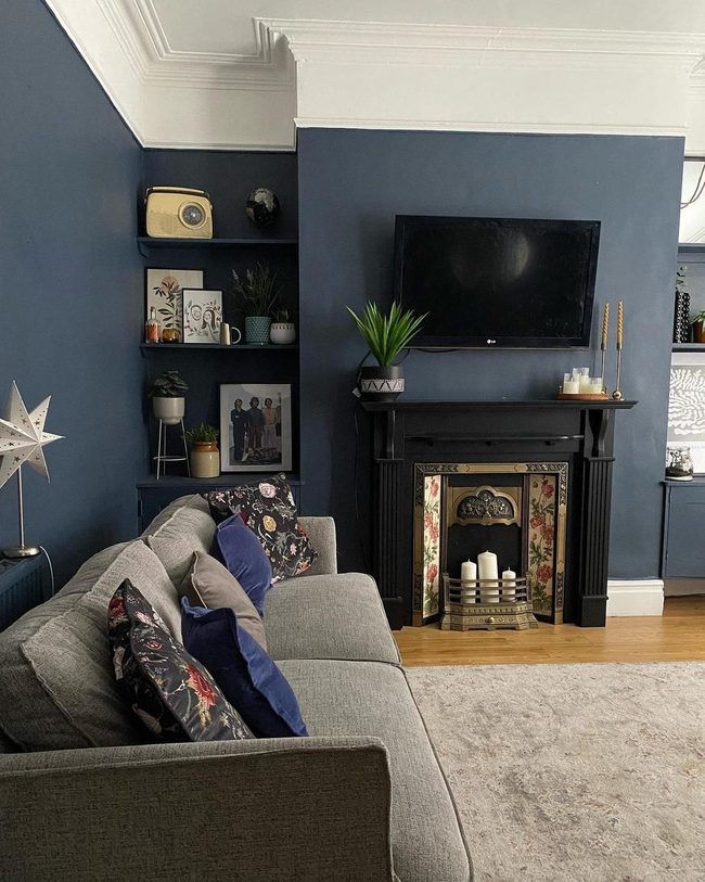 Navy Walls, Black Furniture, Living Plants