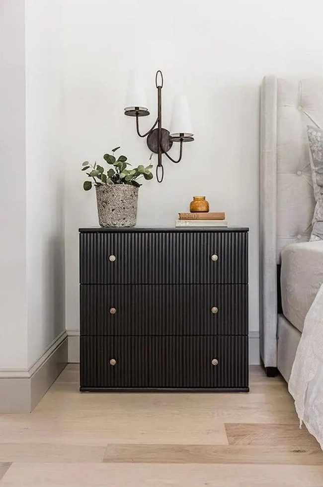 Light Wood, Dark Dressers, Green Plants