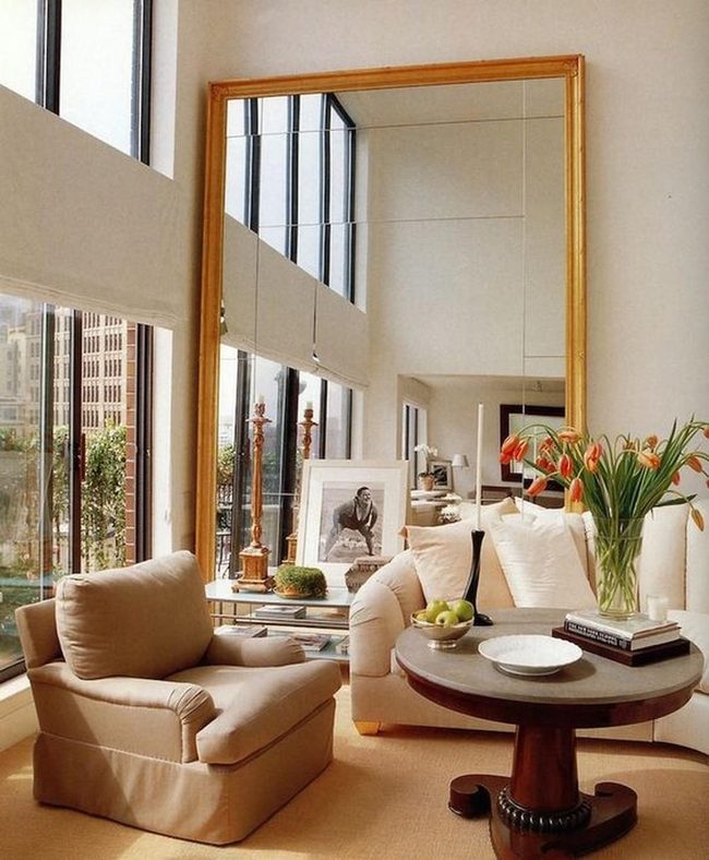 Wooden Mirror Opens Beige Living Space