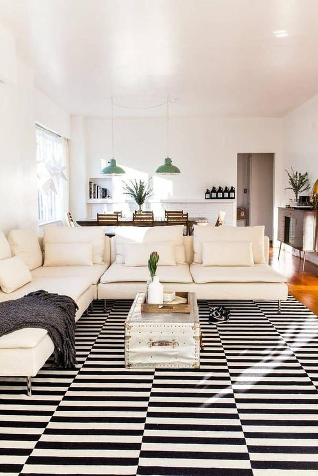 Cream Sofa, Green Lamps, Striped Rug