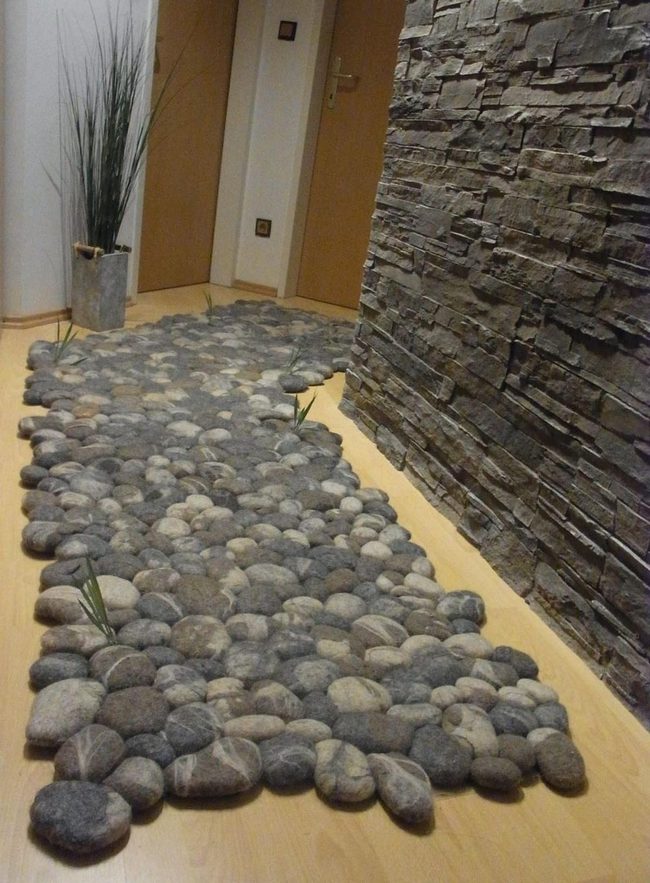 River Stone Floor Meets Stacked Wall