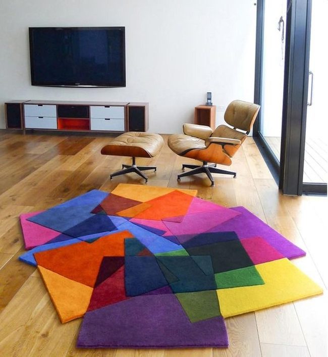 Geometric Rug Anchors Bright Living Room