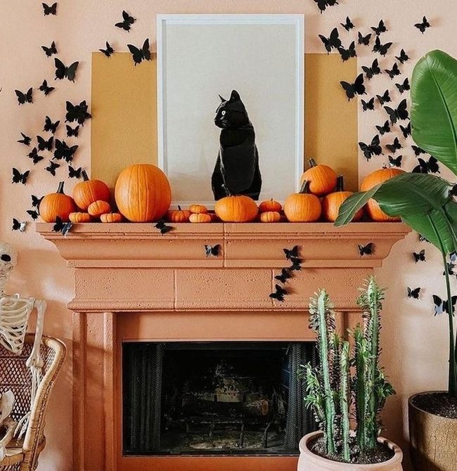 Orange Fireplace With Black Cat Accents