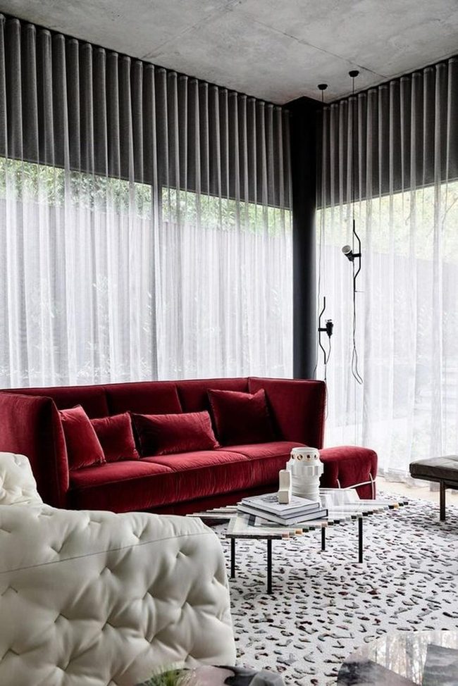Deep Red Sofa Steals The Room