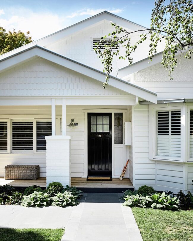 Minimalist Cottage with Black Door