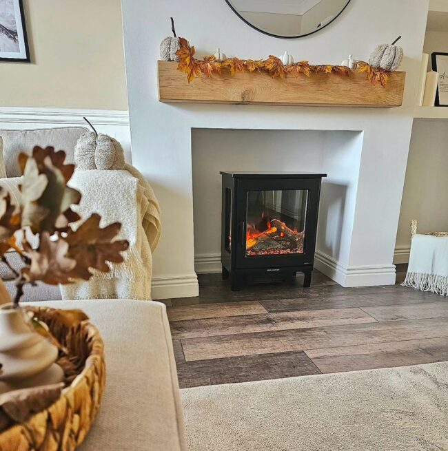 Cozy Fireplace Mantel Adorned with Autumn Leaves